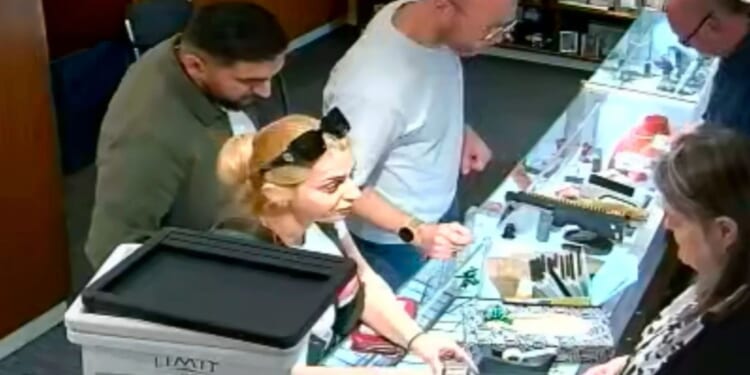 Moment Romanian gang member steals £6k diamond ring from under jeweller's nose
