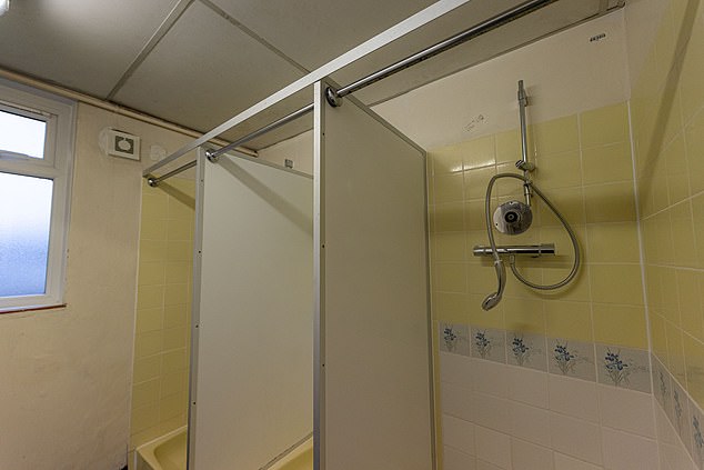 A shower at the military barracks that is now being used to house migrants