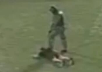 Horror moment killers dressed as cops storm football match before opening fire and killing three