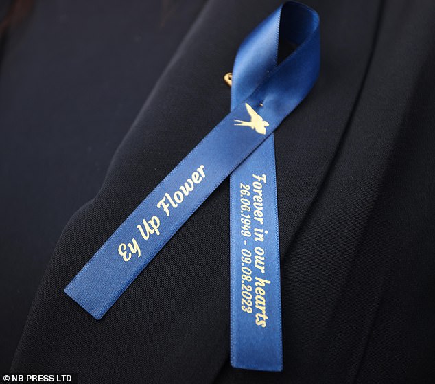 Mr Leadbeater's family wore these blue ribbons to the inquest in Sheffield