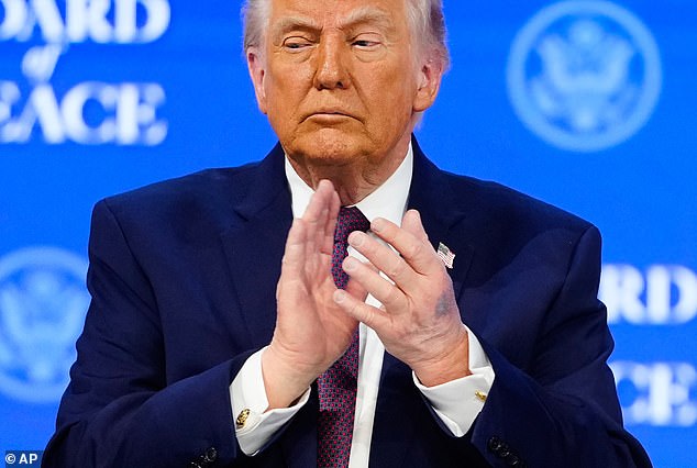 The US president was seen with the new bruise on his left hand at the Board of Peace signing ceremony in Davos on Thursday