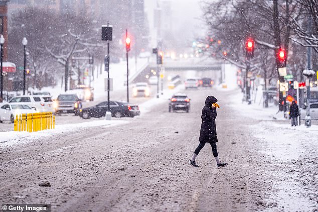 Roughly 160 million people - nearly half the population of the United States - were under a variety of watches, warnings and other alerts associated with the winter storm as of Thursday
