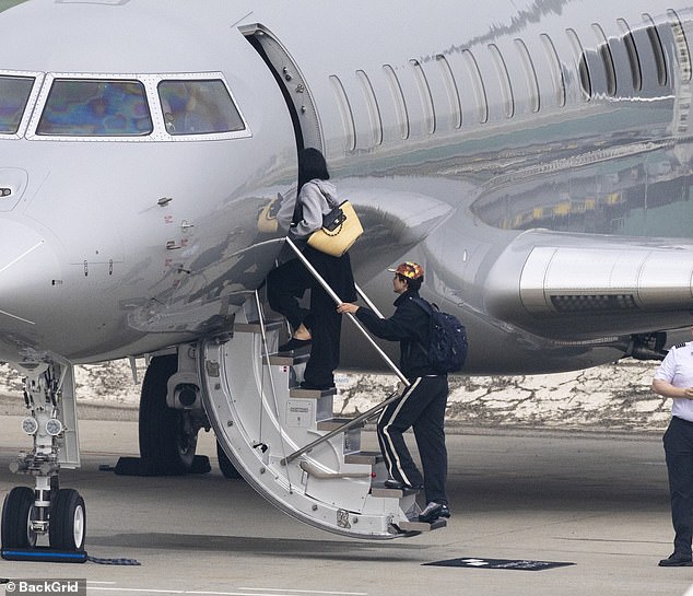 At one point, Jenner climbed the jet's steps first as Chalamet followed closely behind, before the couple disappear inside together
