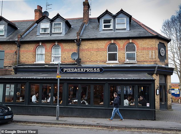 The NatWest Hole, a hole in a wall near the bank in Ilkeston