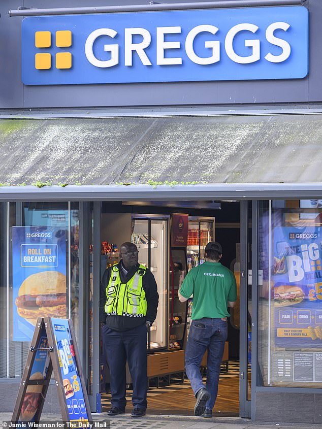 A security guard stands outside Greggs on Croydon high street - with locals saying crime in the area has been 'rife'