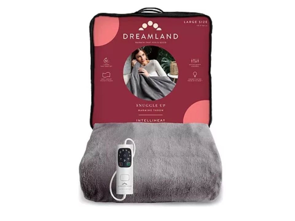 Dreamland Snuggle Up Warming Throw with Intelliheat in grey, with packaging behind it.