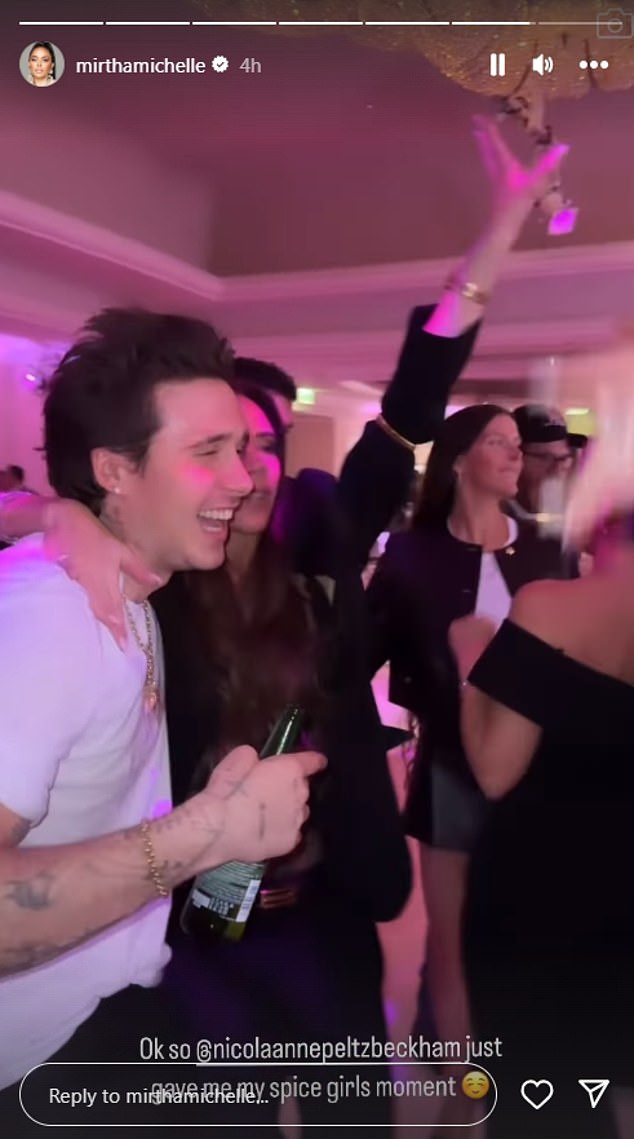 Brooklyn Beckham's wedding DJ has waded into the claims that his mother Victoria was dancing 'inappropriately' at his wedding (Victoria and Brooklyn pictured dancing on another occasion)