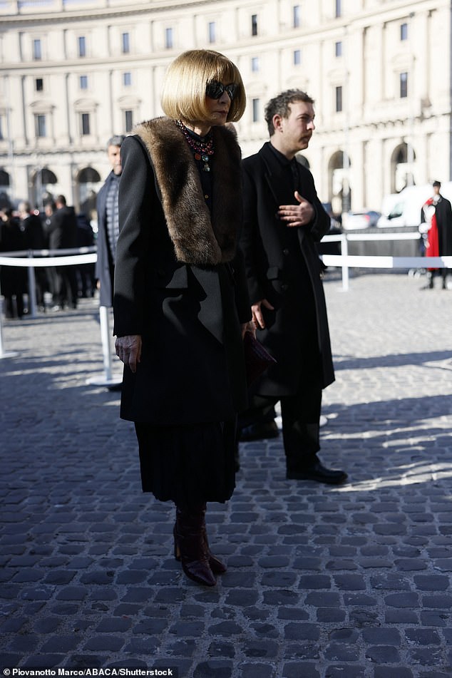 Anna Wintour, Global Chief Content Officer and Artistic Director for Condé Nast and Global Editorial Director for Vogue, shielded her eyes with her signature sunglasses