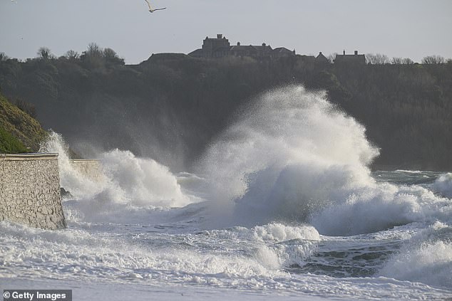 Large waves caused by Storm Ingrid strike Gyllyngvase Beach in Falmouth, Cornwall, today