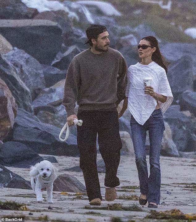 Despite the eyes of the globe being on the controversial couple amid the family drama, on Thursday they enjoyed a carefree walk with their dog in Malibu