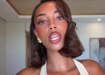 Braless Love Island star Uma Jammeh nearly slips out of daring plunging dress in very sexy new video