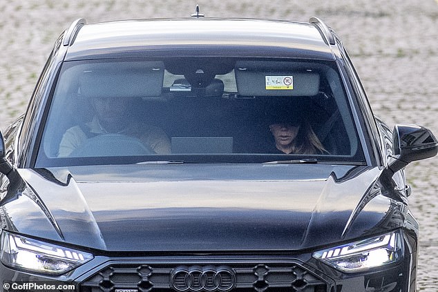 The Spice Girls star, 51, kept a low profile in a black hat which covered her eyes as she was seen being driven in a Mercedes by a male companion