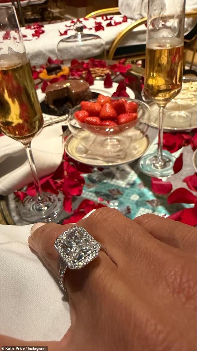 She revealed the pair were celebrating with champagne, strawberries and chocolate cake