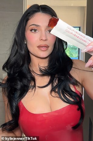 Jenner further examined the jelly texture of the product and said she has begun adding it to her diet because her 'goal is to snack less for the New Year'