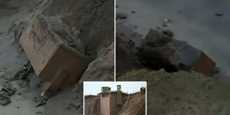 Nuke bunker left teetering on edge of eroded cliff crashes onto beach just days after historian predicted fall