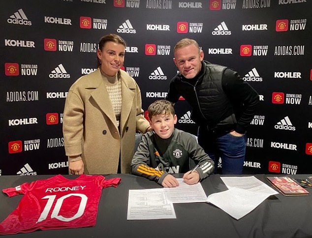 Kai is pictured five years ago signing a Man United contract and is a rising star