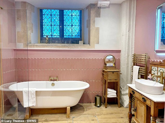 There is even a sleek, new bathroom, which incorporates features from the traditional older building