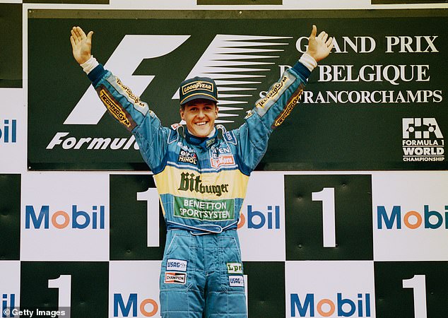 Schumacher celebrates winning the Belgian Grand Prix on the way to his second world championship triumph in 1995