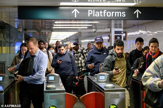 Commuters tap on at Strathfield Station (pictured) in Sydney
