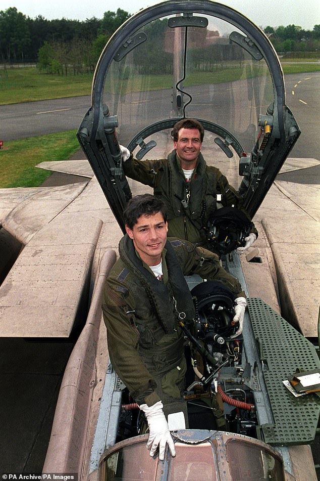 Flt Lt John Peters and Flt Lt Adrian Nichol are pictured at RAF Laarbruch after their first flight together since being shot down during the Gulf War