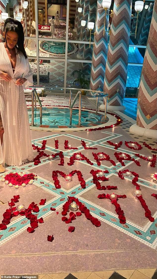 The mother-of-five shared a slew of snaps as she posed by a sea of red roses spelling out 'will you marry me?'