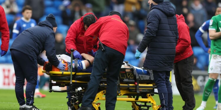 Cardiff vs Stockport EFL clash delayed as star is stretchered off with oxygen after horror injury