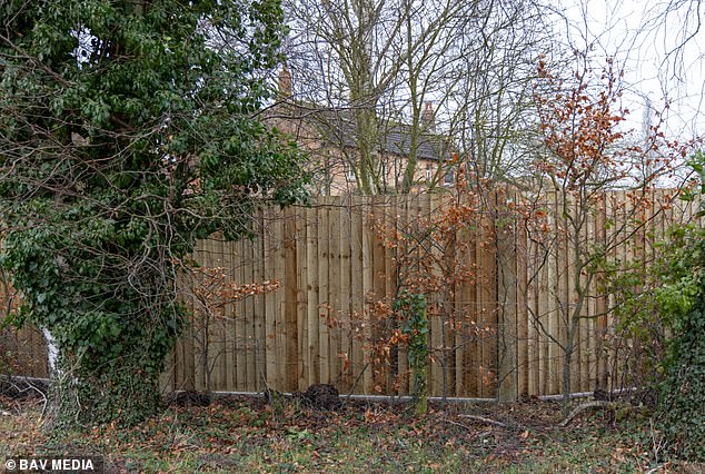 The solid new privacy fence replaces flimsy wire that stood before and allowed a good view from the road