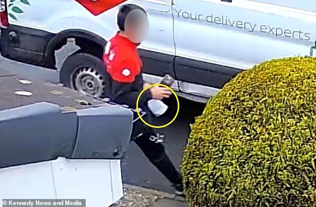 However, the driver returns to his van with the parcel still in his hand, as seen the yellow ring