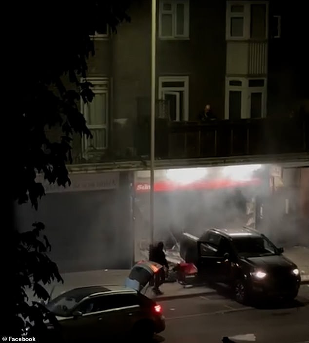 Video footage shows three hooded men using rope attached to a truck to haul the ATM away from the store front in Harold Hill, tearing a part of the building away with it