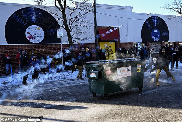 Gas canisters were thrown through the air by immigration enforcement amidst rising protests
