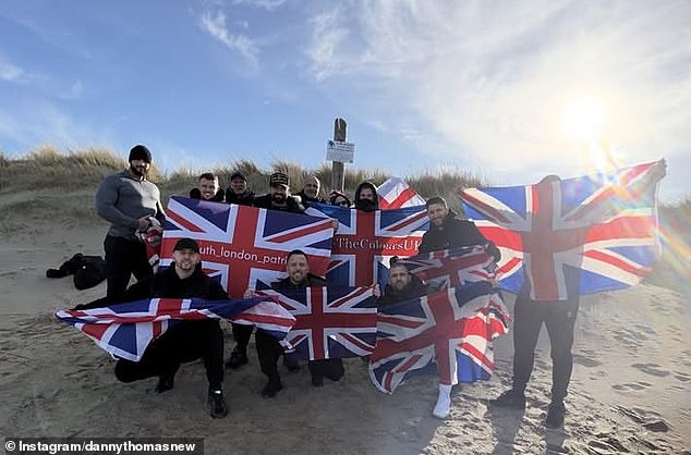 A group, organised by Danny Thomas, protesting in Calais as part of Operation Overload
