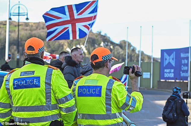 Police watch as protesters take to the streets of Dover in what has been dubbed Operation Overload by organiser Danny Thomas