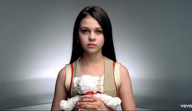 At just 13, she played an 'angry teen' in Miley Cyrus' music video for her hit 7 Things
