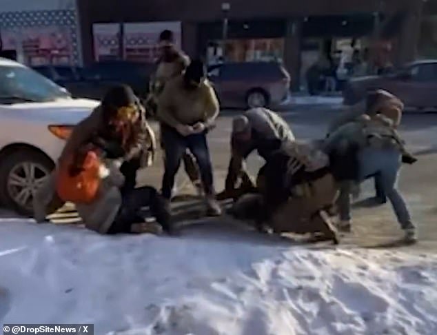 Pretti was seen lying on the ground surrounded by federal agents