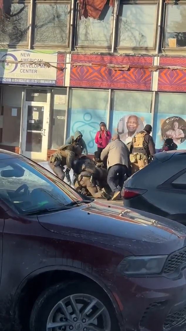 Video showed the agents wrestling the man to the ground before one federal agent fired multiple shots into his chest