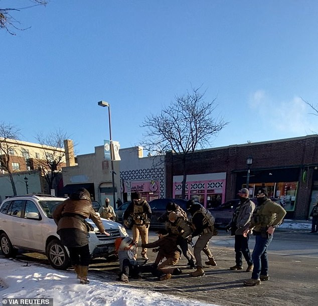 Pretti could be seen trying to assist a women who was on the ground when officers stepped in