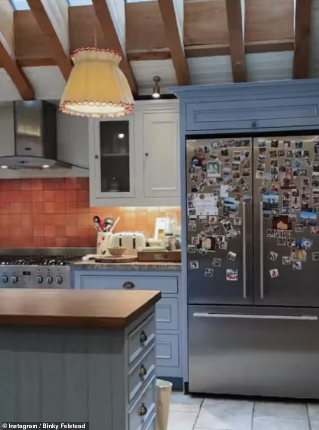 The oversized fridge, large island and bar setup really anchor the room and make it feel designed for hosting, Jordana said