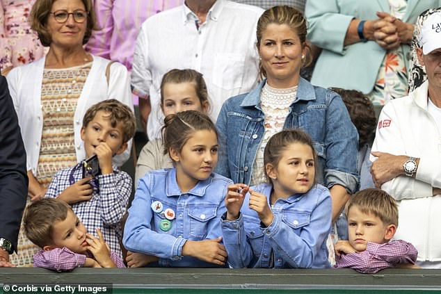 All three children have long been accustomed to watch courtside, with the 16-year-old twins frequent fixtures in their father Roger's player box (pictured in 2019)
