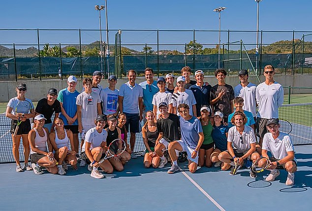 But the two girls could find themselves more involved in tennis, having taken part in training at the Rafael Nadal Academy (pictured seated, far left)