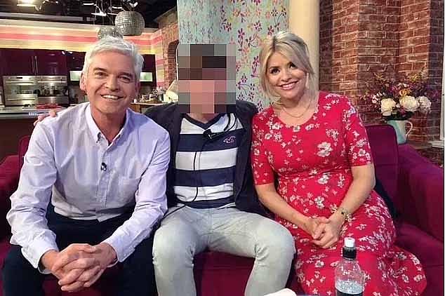 Schofield admitted to a relationship with a much younger male colleague (pictured centre) and having lied about it to bosses - as well as his loved ones. He has left TV