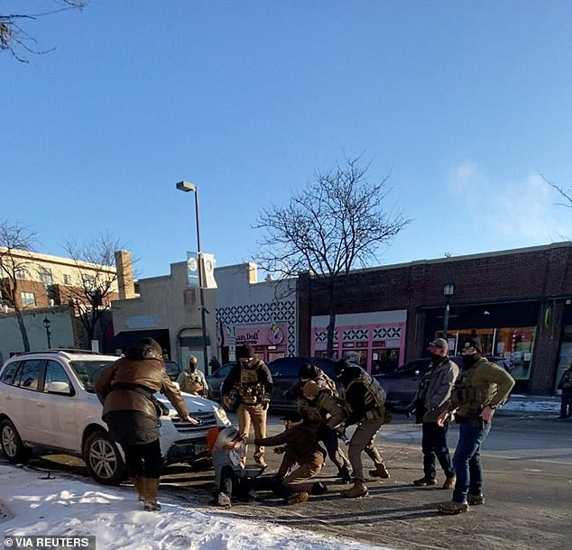 Pretti could be seen trying to assist a women who was on the ground when officers stepped in