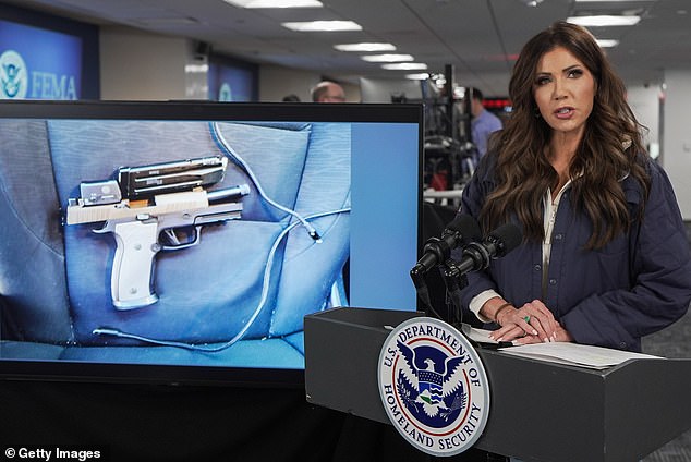A picture of Pretti's recovered handgun is shown at a briefing held by Homeland Security secretary Kristi Noem