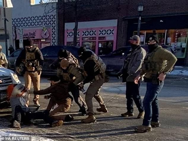 Video shows Alex Pretti, 37, already pepper-sprayed and on his knees when the clip begins