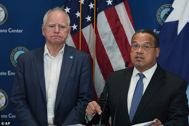 The president's decree comes just hours after Walz begged Trump to remove federal agents from his state. He is pictured with Minnesota Attorney General Keith Ellison