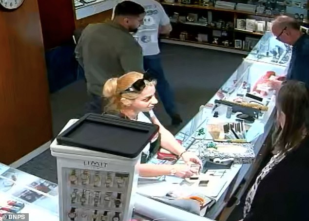 Blink and you'd miss it: Claudia Rostas is seen swiping the diamond ring from a box in Hamilton's jewellers in Dorset, on April 26, 2025