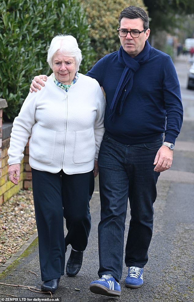 Mr Burnham, pictured walking with his mother, broke his silence to criticise the 'way the Labour Party is being run' after revealing the media was told about the decision before he was