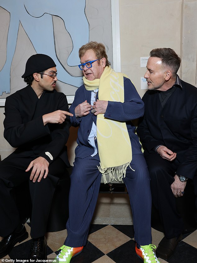 Elton, who attended the Jacquemus show, has been a close friend of the Beckhams for more than 30 years and is Brooklyn's godfather