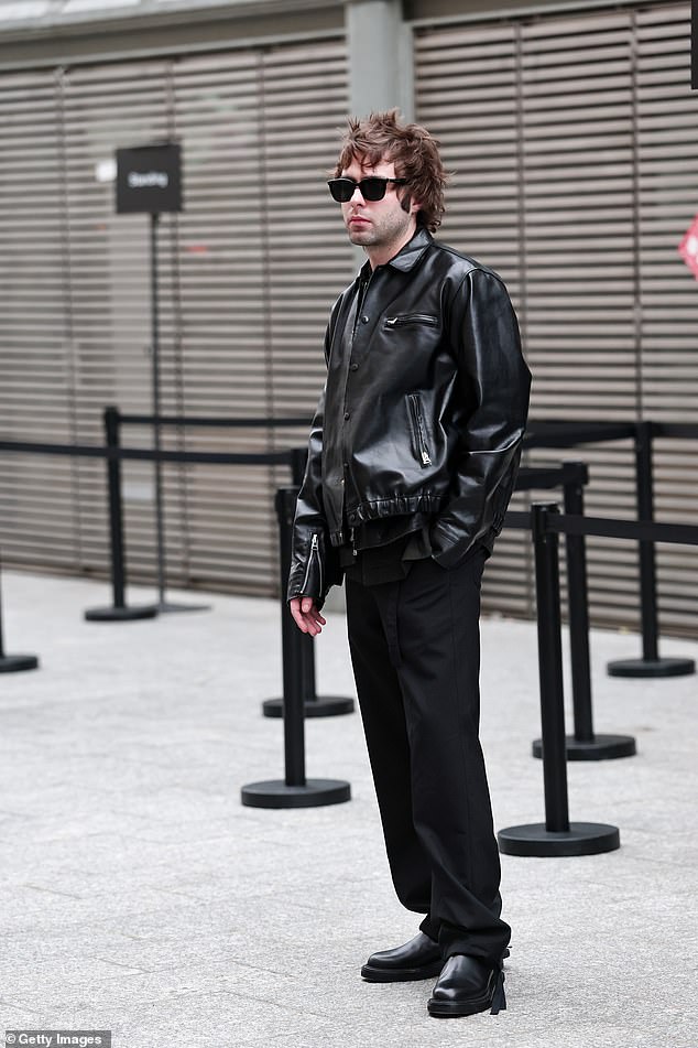 Liam Gallagher's son, 26, cut a cool figure in a PVC bomber jacket and shades