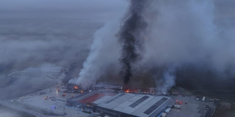 At least three women killed & two missing as huge inferno rips through biscuit factory after explosion