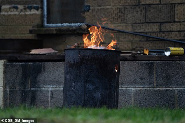 Residents say they've been unable to stop the workmen burning the waste and feel intimidated